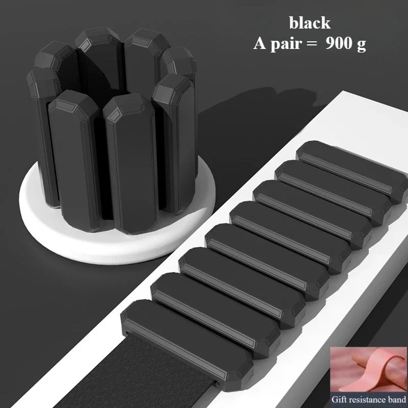 Black resistance bands with a holder on a dark background