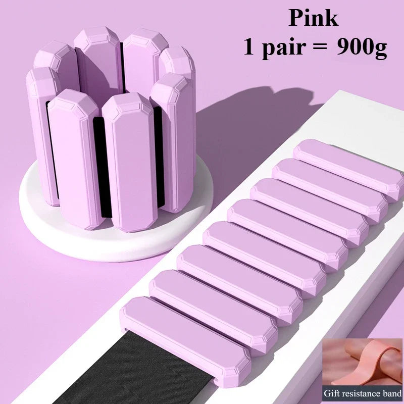 Pink resistance bands with a holder on a light purple background
